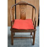 AN EARLY 20TH CENTURY CHINESE CARVED ELM CHAIR. 94 cm x 52 cm x 58 cm.