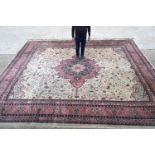 A large country house rug 500 x 420 cm .