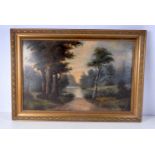 A large framed 19th Century oil on board of a lake signed indistinctly 48 x 72 cm.