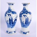 A PAIR OF 19TH CENTURY CHINESE BLUE AND WHITE PORCELAIN VASES Kangxi style. 15 cm high.