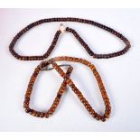 TWO MIDDLE EASTERN AMBER TYPE PRAYER BEAD NECKLACES. 198 grams. Longest 86 cm. (2)