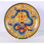 A Chinese Cloisonne enamel dish decorated with a dragon 25cm