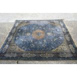 A large blue ground Indian rug 368 x 320 cm.