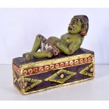 A South east Asian carved wood pen box carved with a decorated figure of Twalen 19 x 15 x 6.5 cm