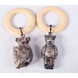 TWO ANTIQUE SILVER AND IVORINE BABIES TEETHING RATTLES. Chester 1895 & Birmingham 1900. 33 grams. 11