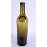 A GREEN GLASS WINE BOTTLE bearing initials to front SS. 31 cm high.