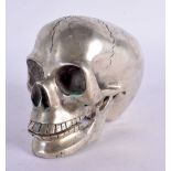 A CONTEMPORARY SILVER PLATED SKULL INKWELL. 11 cm x 9 cm.