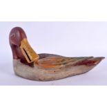 A VINTAGE CARVED AND PAINTED FOLK ART DECOY DUCK. 34 cm x 12 cm.