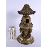 A 19TH CENTURY JAPANESE MEIJI PERIOD BRONZE PAGODA formed with buddhistic beasts under a temple. 32