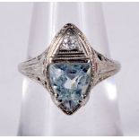 AN 18CT WHITE GOLD, DIAMOND AND AQUA RING. Stamped 18K, Size L, weight 3.1g