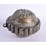 A 19TH CENTURY MIDDLE EASTERN COPPER ALLOY BETEL LIME BOX possibly Bhutan. 10 cm wide.
