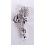 A PLATINUM AND DIAMOND FLOWER BROOCH. 4.4cm x 1.9cm, weight 6.5g