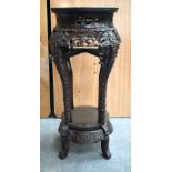 A 19TH CENTURY CHINESE MARBLE INSET HARDWOOD STAND. 80 cm x 38 cm.