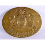 AN UNUSUAL ANTIQUE COUNTRY HOUSE WELCOME BRONZE PLAQUE decorated with a pineapple. 21 cm x 15 cm.