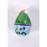 A CONTINENTAL SILVER AND ENAMEL EGG PENDANT. Stamped 84, 2.5cm x 1.6cm, weight 5.7g