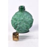 A MALACHITE GLASS SCENT BOTTLE. 5.25 cm x 4 cm.