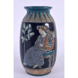 AN ART DECO AUSTRIAN ENAMELLED POTTERY VASE painted with a female playing a lyre. 14 cm high.