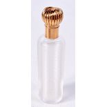 AN 18CT GOLD TOPPED SCENT BOTTLE. Indistinguishable marks, 9.1cm x 2.4cm