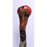 A RARE ANTIQUE FOLK ART DOUBLE HEAD WALKING CANE. 86 cm long.