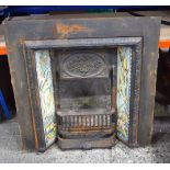 A cast Iron tiled fireplace 97 x 97 cm.