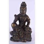 A 19TH CENTURY CHINESE BRONZE FIGURE OF A SEATED FEMALE DEITY modelled with one hand raised. 17 cm x