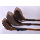 THREE HICKORY SHAFTED DRIVING WOOD GOLF CLUBS including Forgan, George Tully & another. 108 cm long.