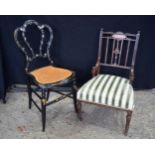 A VICTORIAN LACQUERED CHAIR and another. Largest 90 cm x 30 cm. (2)