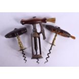 THREE ANTIQUE CORKSCREWS with wooden handles. Largest 17 cm x 9 cm. (3)