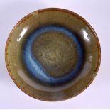 A STUDIO POTTERY CHINESE STYLE DISH. 15 cm diameter.