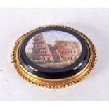 AN ANTIQUE YELLOW METAL MICRO MOSAIC BROOCH. 10.8 grams. 4 cm x 3.25 cm.