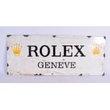 A ROLEX ENAMELLED SHOP DISPLAY SIGN. 64 cm x 24 cm.