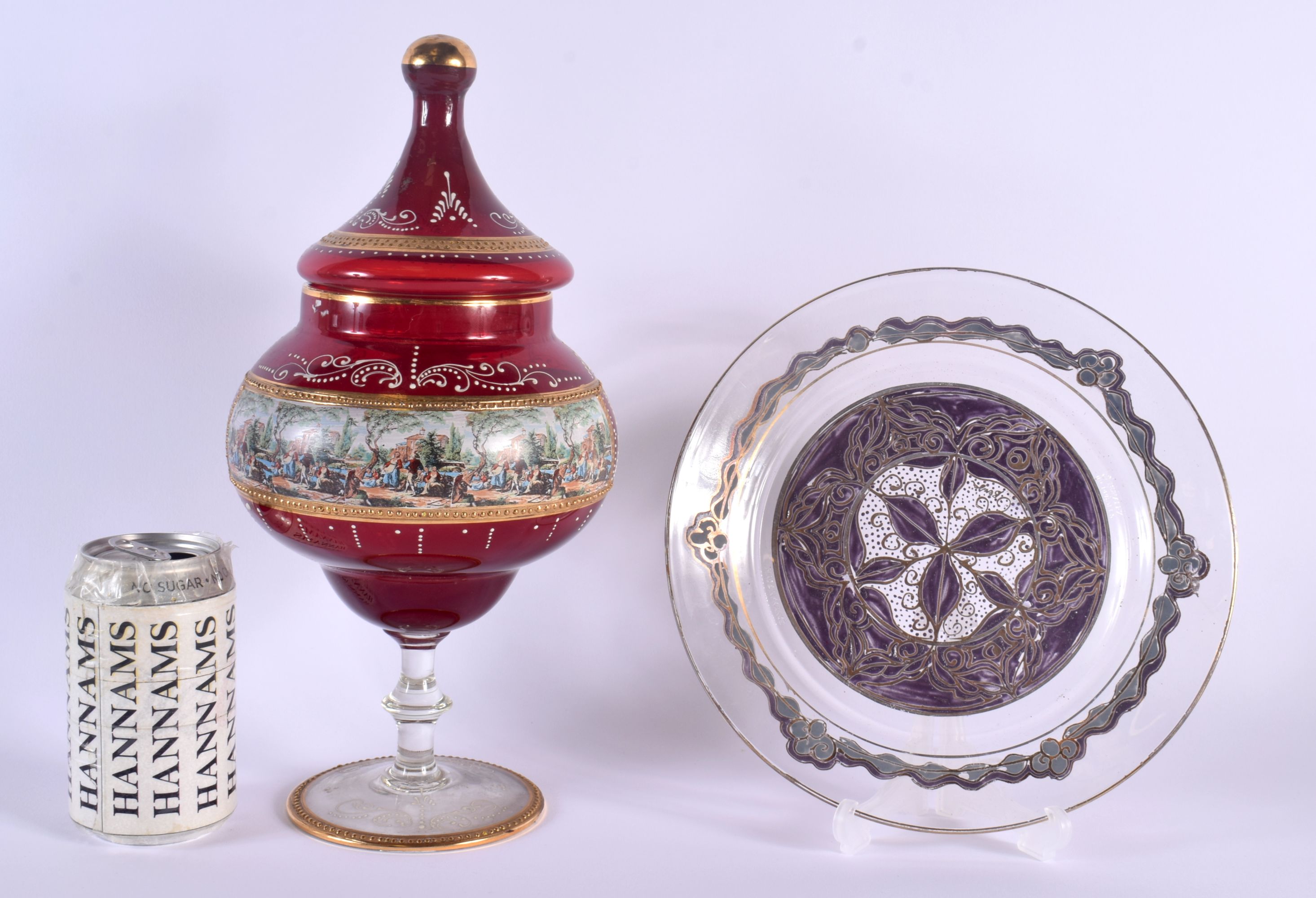 AN UNUSUAL BOHEMIAN CRANBERRY ENAMELLED GLASS VASE AND COVER together with an unusual enamelled plat