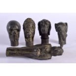 FIVE CONTEMPORARY BRONZE WALKING CANE HANDLES. Largest 9 cm long. (5)