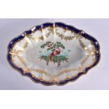 18th century scalloped oval dish painted with exotic birds in landscape surrounded by gilt pedants a