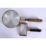 TWO VINTAGE MAGNIFYING GLASSES. Largest 22.5 cm long. (2)