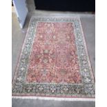 A large finely knotted rug possibly silk 280 x 185 cm.