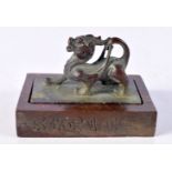 A Chinese bronze seal in the form of a beast 6 x 8 x 6 cm.
