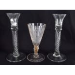 A FINE EUROPEAN ENGRAVED GLASS CAMEO WINE GLASS together with two others. Largest 21 cm high. (3)
