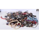 A huge collection of costume jewellery/necklaces/. (Qty)