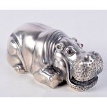 A CONTINENTAL SILVER HIPPO WITH GEM SET EYES. Stamped 88, 3.5cm x 7.8cm x 3.8cm, weight 73.7g