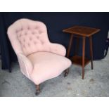 AN EDWARDIAN SIDE TABLE and a late Victorian upholstered chair. Largest 77 cm x 60 cm. (2)