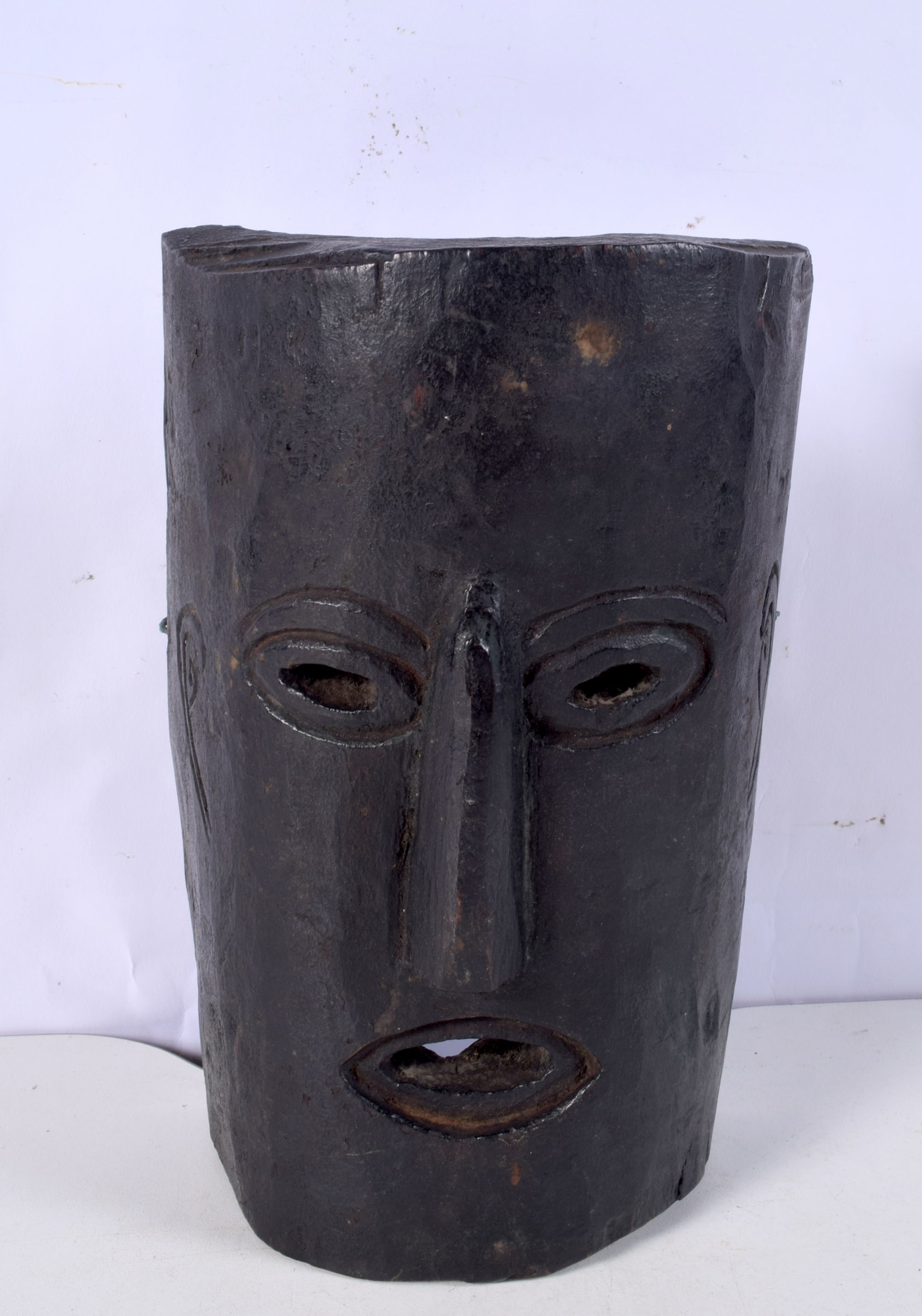 A craved African tribal mask 24 x 16 cm.