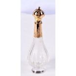 AN 18CT GOLD TOPPED SCENT BOTTLE. Indistinguishable marks, 11cm x 3.6cm