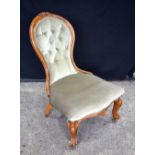 A VICTORIAN UPHOLSTERED CHAIR. 90 cm x 45 cm.
