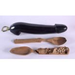 AN UNUSUAL VINTAGE CARVED WOOD PHALLIC BOTTLE OPENER of rather large proportions, together with a pa