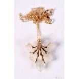 A 14CT GOLD DIAMOND AND ROCK CRYSTAL PENDANT. 3.2 grams. 44 cm long, pendant 2.25 cm x 2 cm.