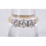A GOOD 18CT GOLD AND DIAMOND THREE STONE RING. 3.4 grams. N.