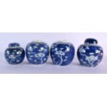 FOUR 19TH CENTURY CHINESE BLUE AND WHITE GINGER JARS Kangxi style. Largest 15 cm x 11 cm. (4)