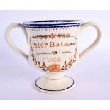 A CHARMING EARLY 19TH CENTURY ENGLISH TWIN HANDLED FROG MUG depicting Peter Bates. 18 cm wide.