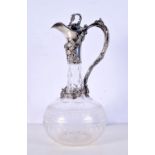A Victorian cut glass Claret jug etched with symmetric pattern and mounted with silver plate 29 cm,